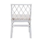 White rattan dining chair from the front view.