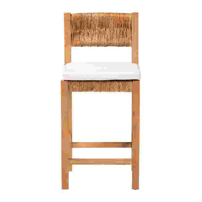 Front view of woven seagrass counter stool with wood frame and white seat cushion.