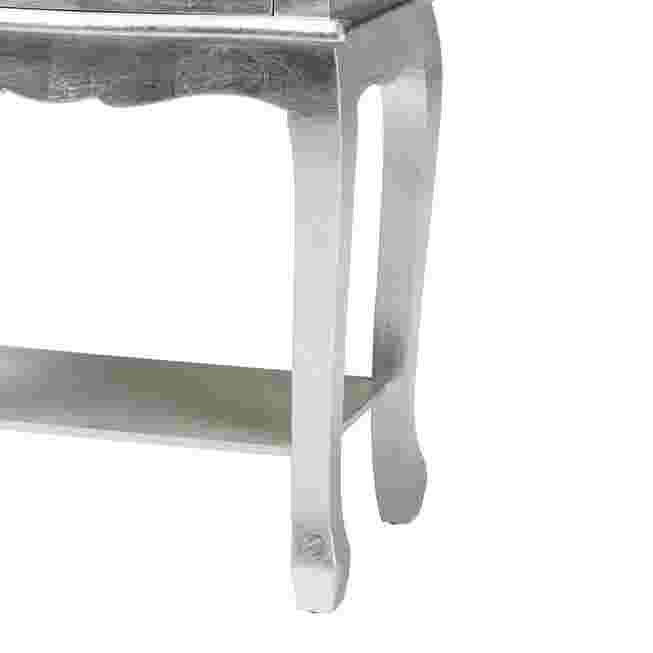 Close-up of the leg and lower shelf of the nightstand