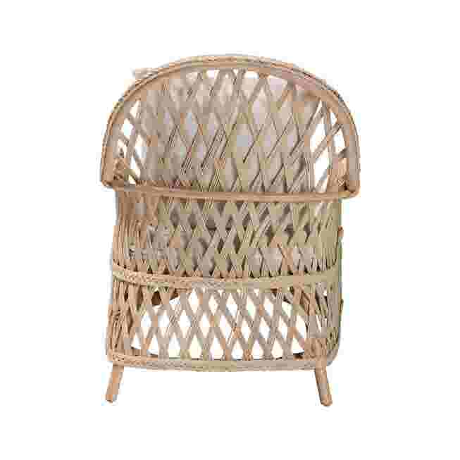 Back view of ivory braided rattan armchair with white cushion