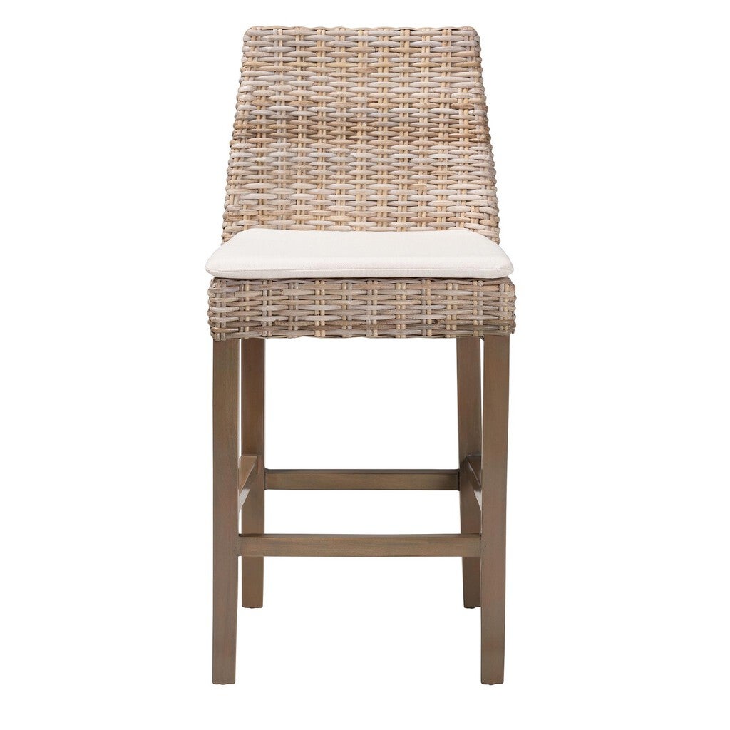Front view of a woven rattan bar stool with a cushioned seat, showing full height