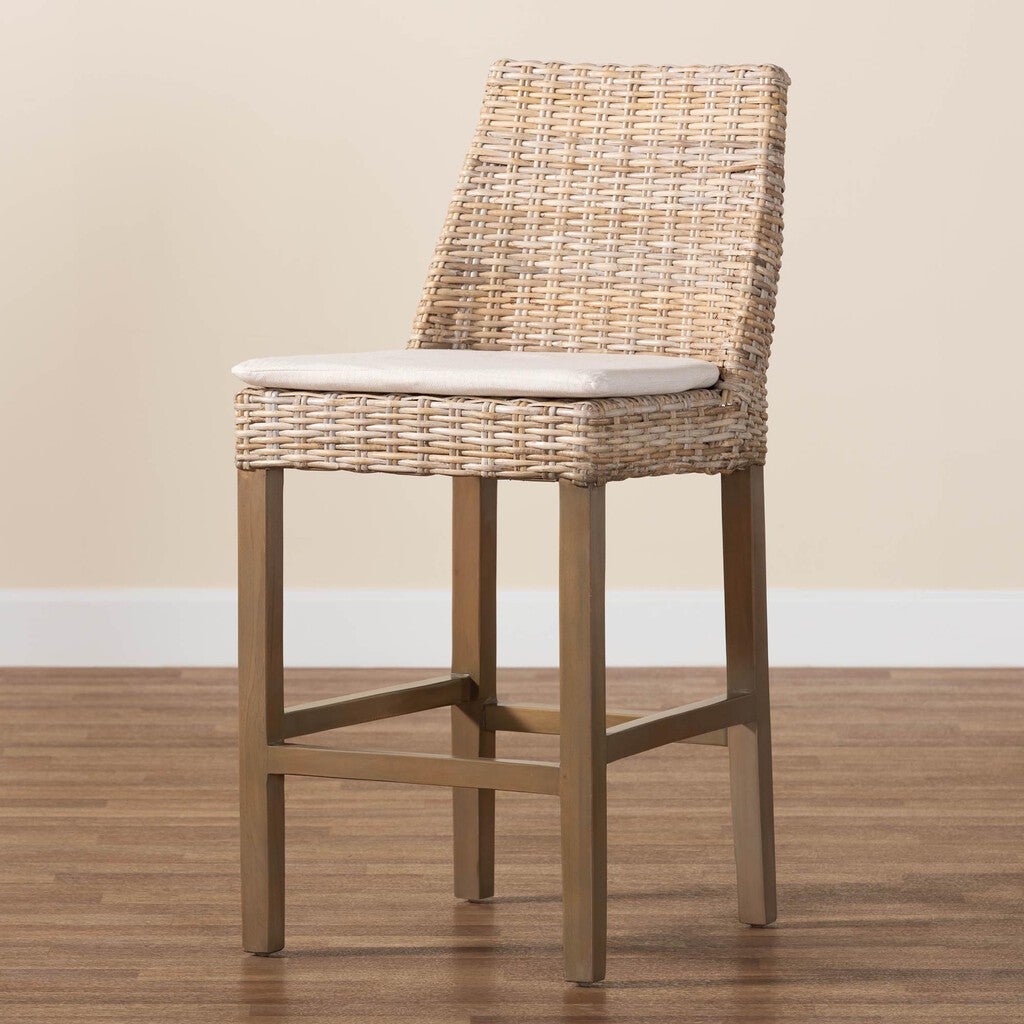 Single rattan bar stool with cushion in a room, front-facing
