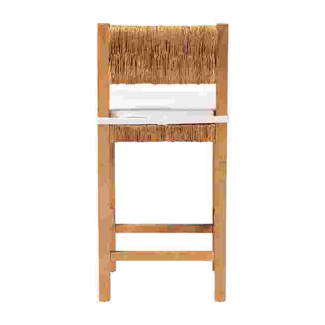 Back view of woven seagrass counter stool with light wood frame and white cushion.