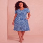 Plus Size Stretch Knit Pocket Swing Dress image number 0